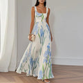Oria - Vestido largo de corte en A con estampado floral